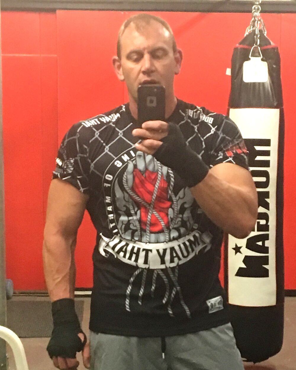 Justin Kerkman training at a Muay Thai gym.